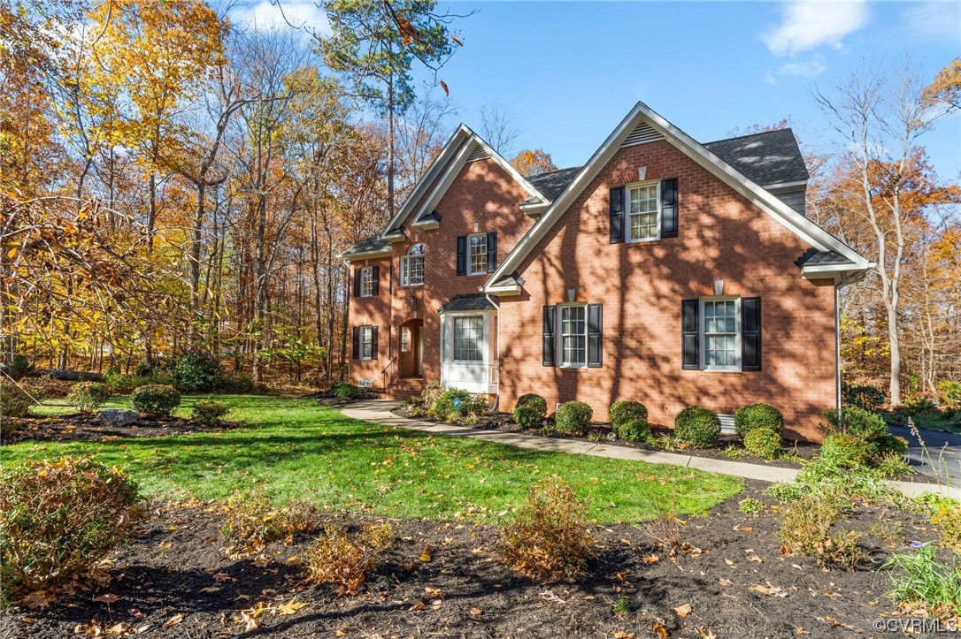 3430 Robious Forest Way Midlothian, VA 23113 - Photo 41 of 50 a front view of a house with a yard