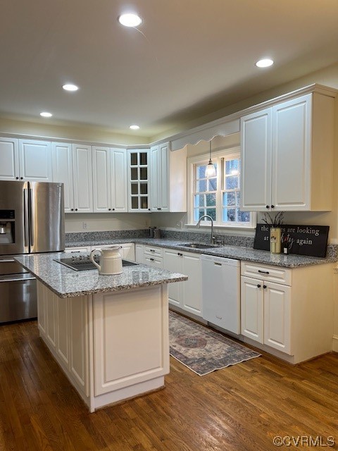 3430 Robious Forest Way Midlothian, VA 23113 - Photo 44 of 50 a kitchen with stainless steel appliances granite countertop a sink a stove a refrigerator and island with wooden floor
