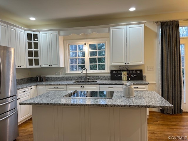 3430 Robious Forest Way Midlothian, VA 23113 - Photo 49 of 50 a kitchen with granite countertop a sink a stove and cabinets