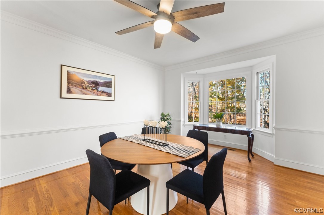 3430 Robious Forest Way Midlothian, VA 23113 - Photo 7 of 50 a view of a dining room with furniture window and wooden floor