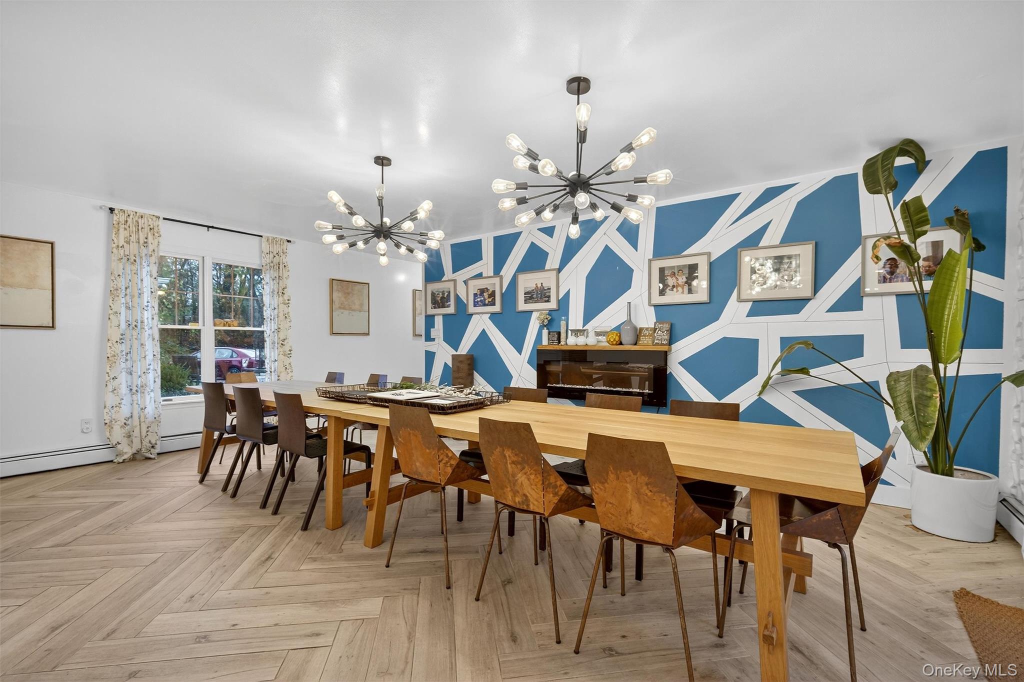 46 Roselawn Road Highland Mills, NY 10930 - Photo 11 of 49 a view of a dining room with furniture and chandelier