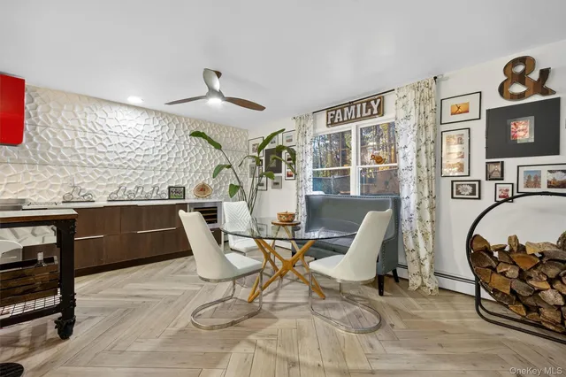 a view of a dining room with furniture window and outside view