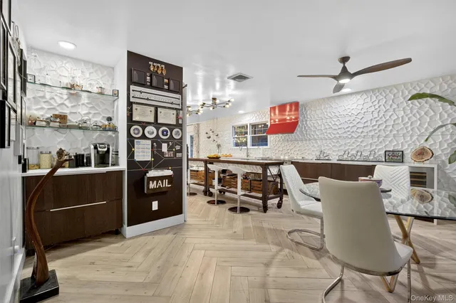 a kitchen with stainless steel appliances granite countertop a refrigerator and stove