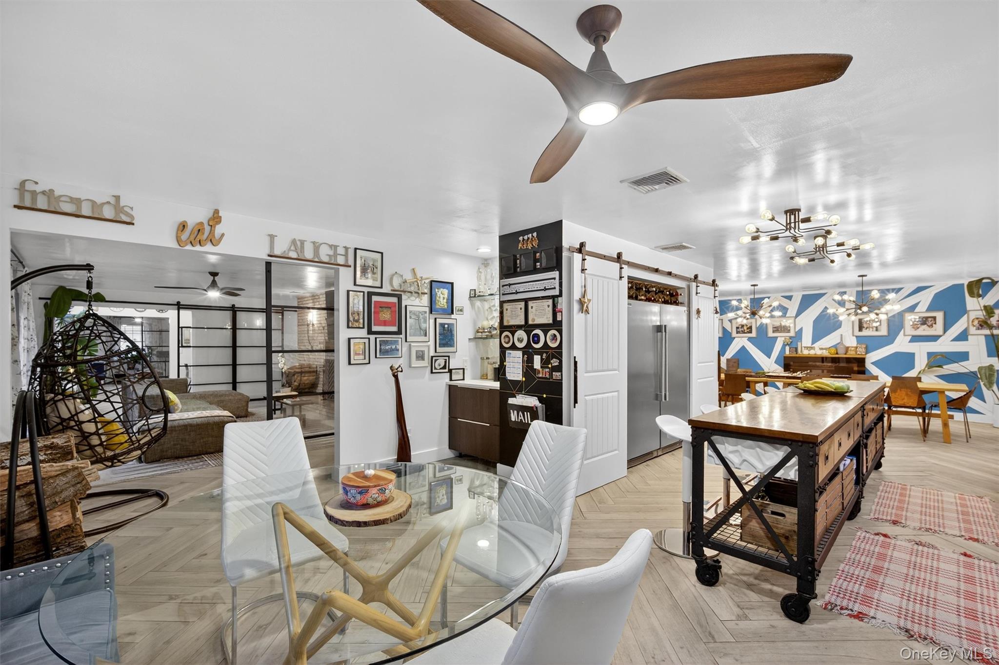 46 Roselawn Road Highland Mills, NY 10930 - Photo 17 of 49 a living room with lots of furniture and chandelier