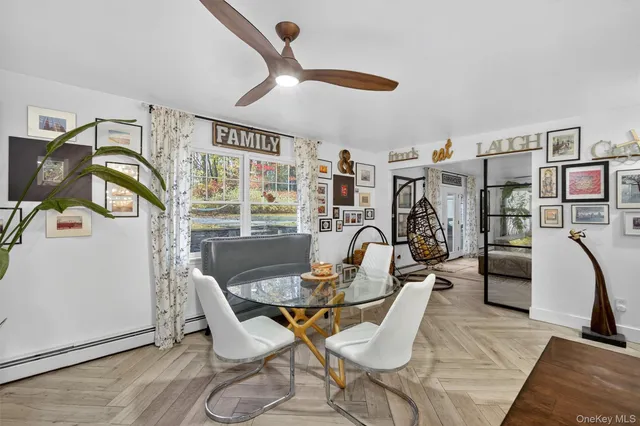 a work room with furniture and wooden floor