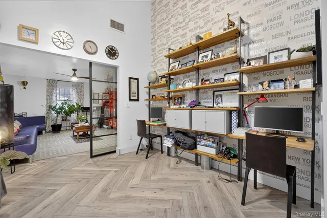 a view of a workspace with furniture