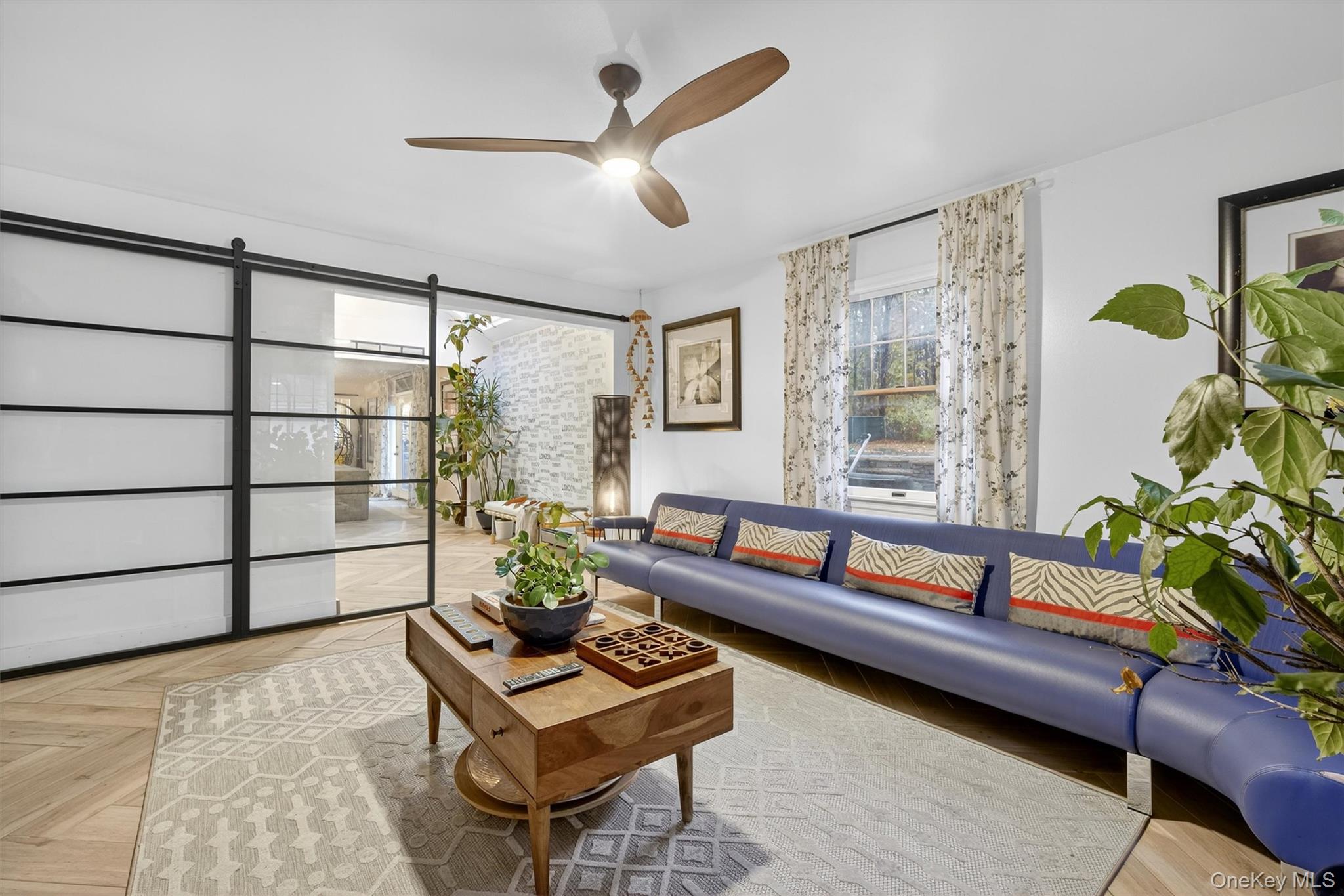 46 Roselawn Road Highland Mills, NY 10930 - Photo 25 of 49 a living room with furniture and a potted plant