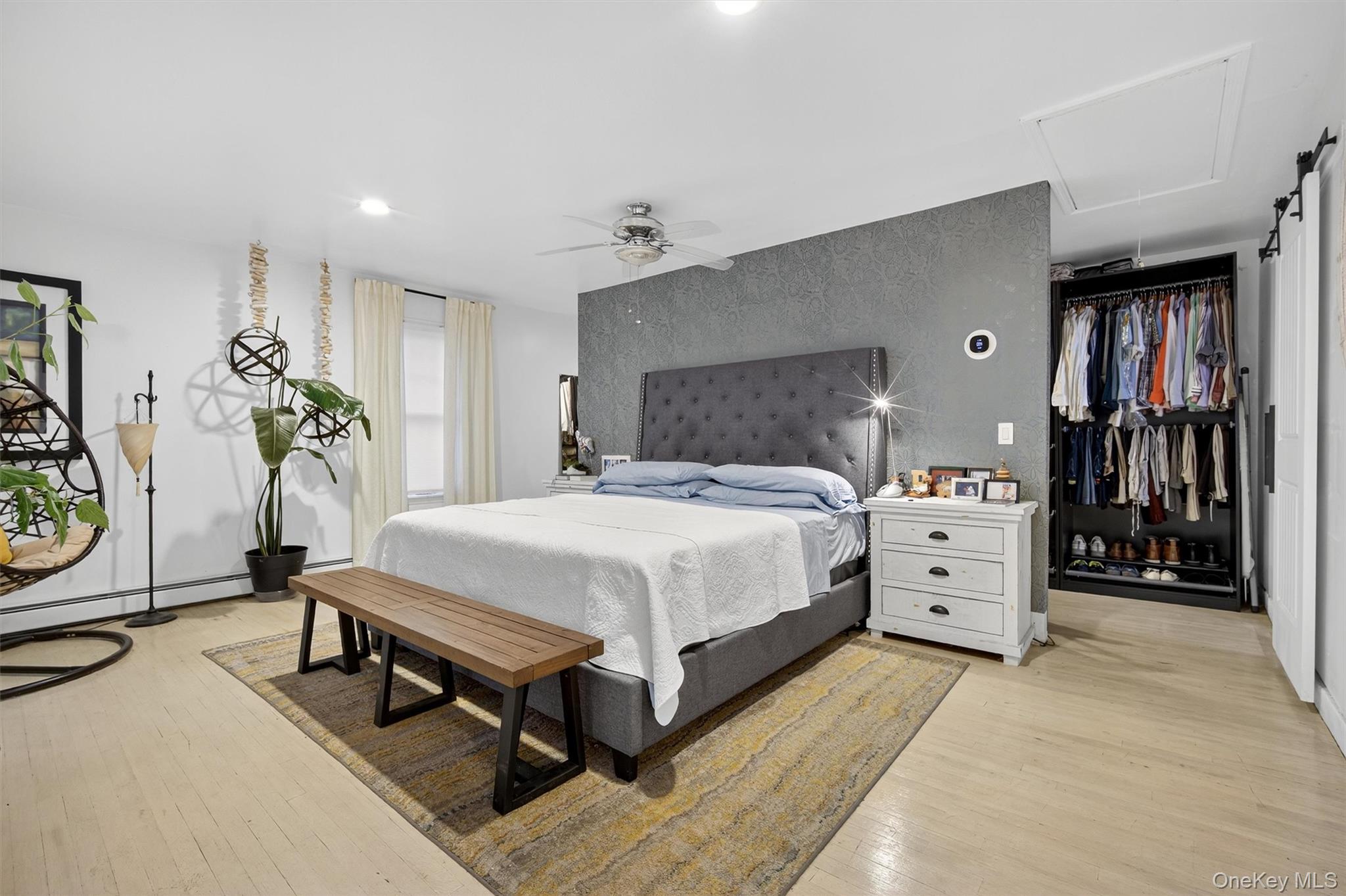 46 Roselawn Road Highland Mills, NY 10930 - Photo 28 of 49 a bed room with a bed and a lamp