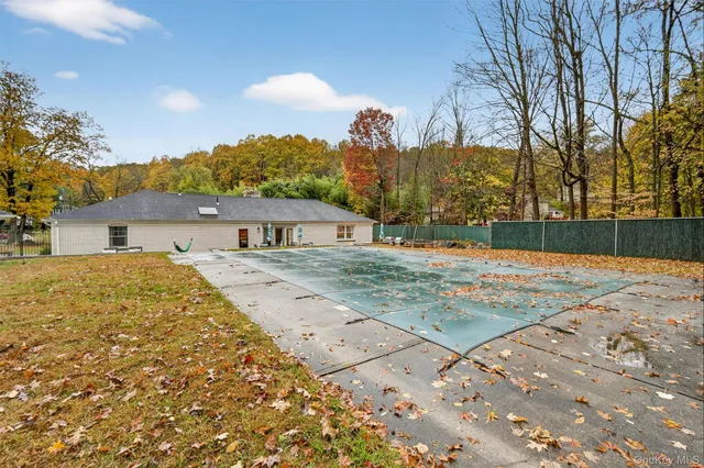 a view of a house with a snow on the ground