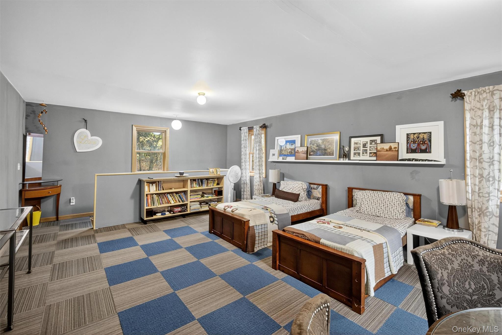 46 Roselawn Road Highland Mills, NY 10930 - Photo 48 of 49 a living room with furniture and a rug