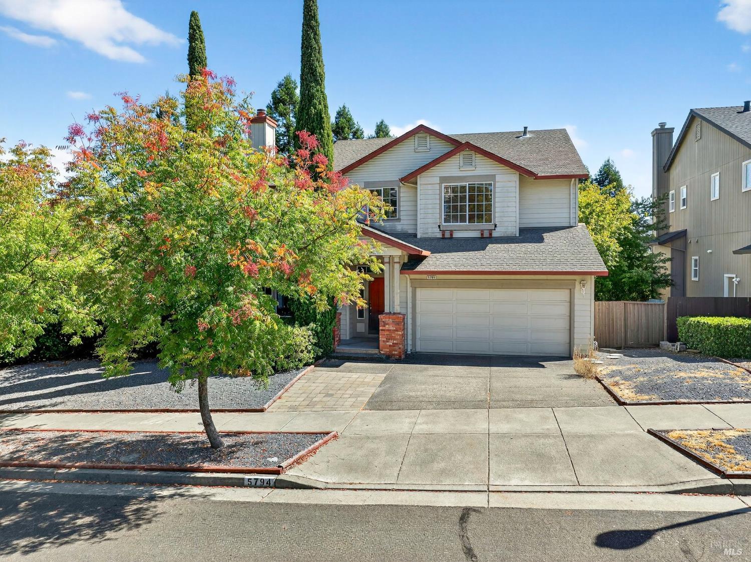 5794 Owl Hill Avenue Santa Rosa, CA 95409 - Photo 1 of 56 a front view of a house with a yard and garage