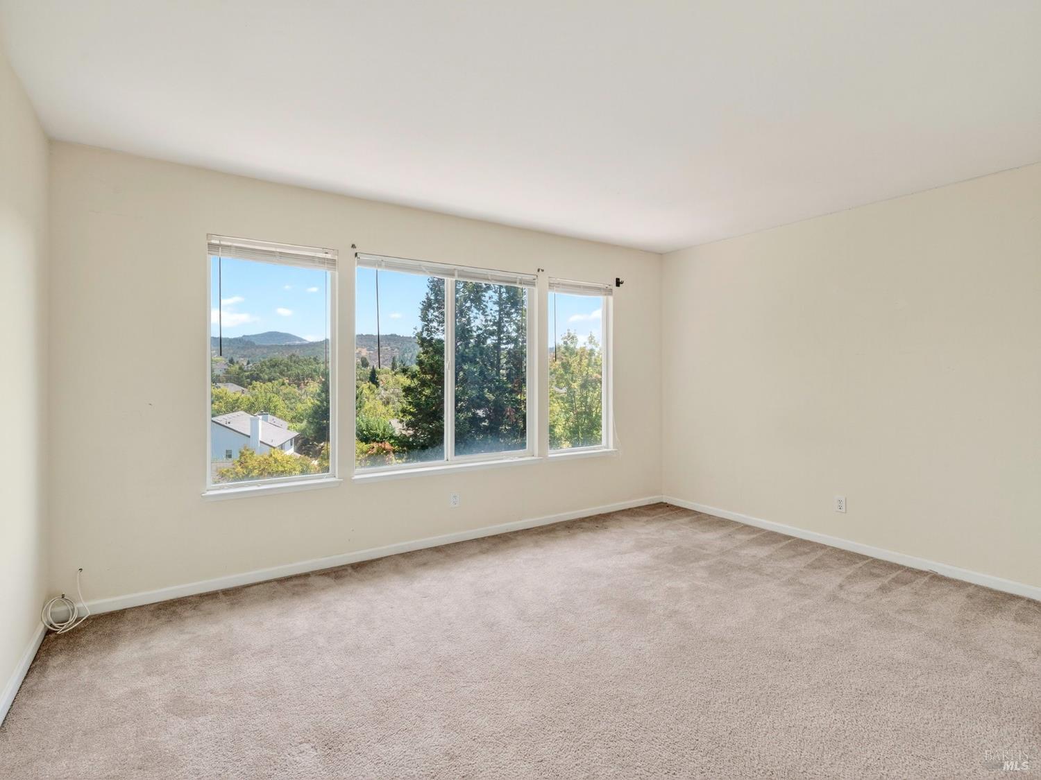 5794 Owl Hill Avenue Santa Rosa, CA 95409 - Photo 27 of 56 an empty room with windows