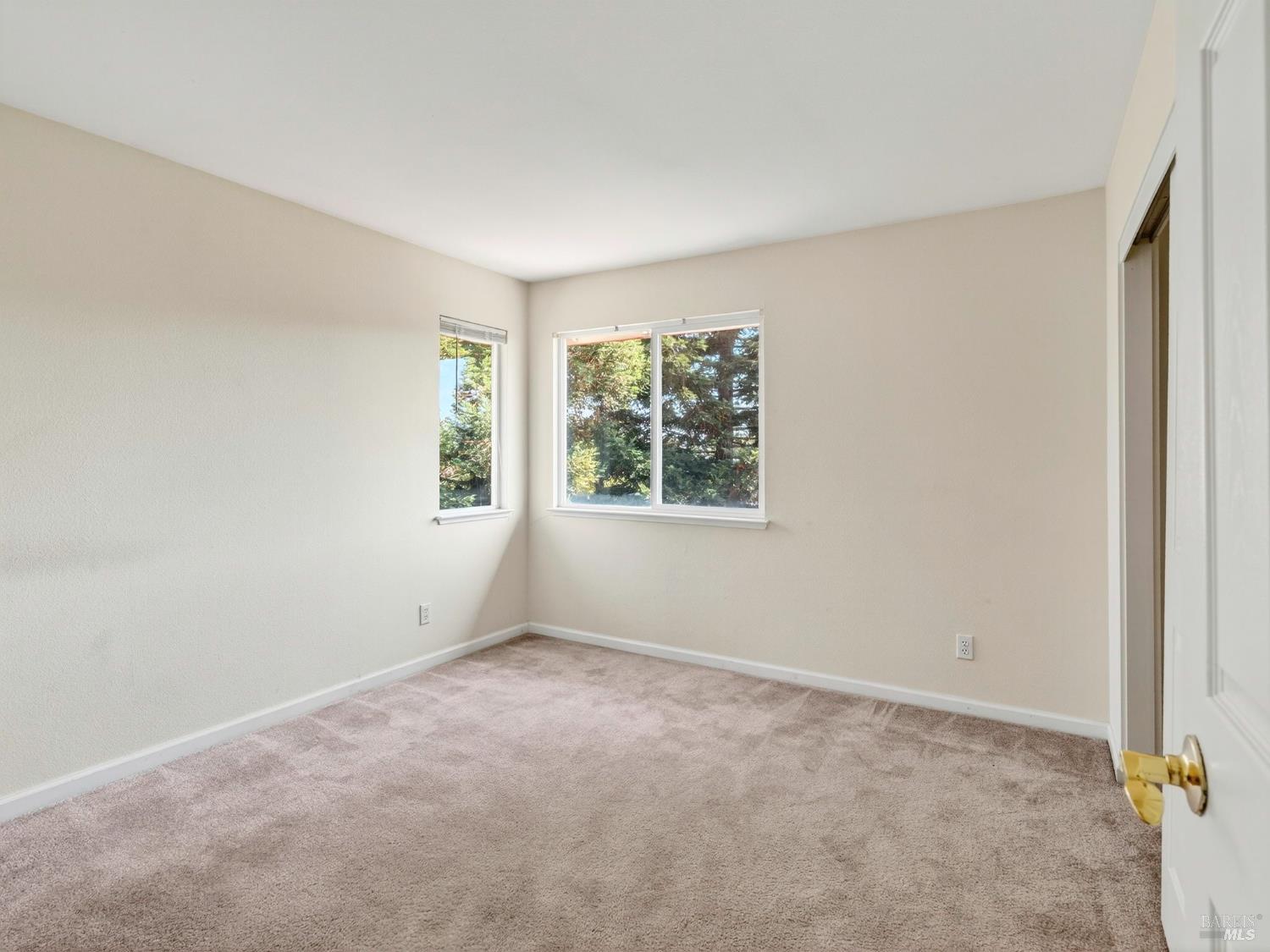 5794 Owl Hill Avenue Santa Rosa, CA 95409 - Photo 31 of 56 an empty room with windows