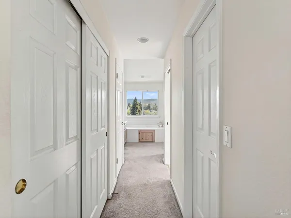 a view of balcony with wooden floor