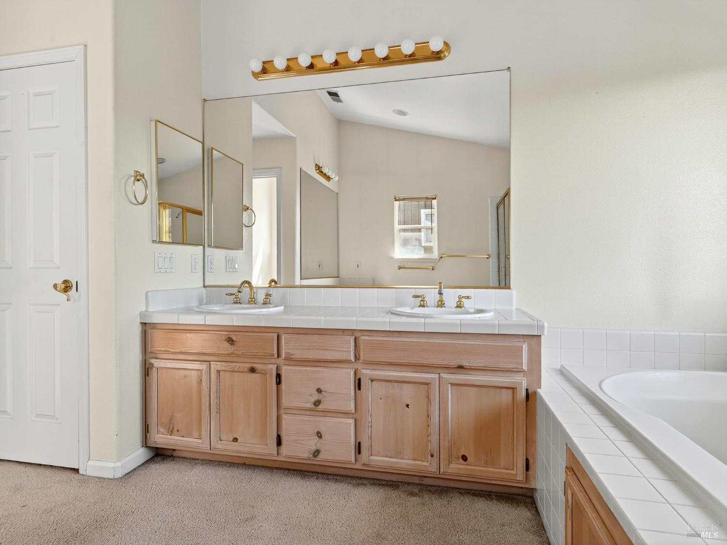 5794 Owl Hill Avenue Santa Rosa, CA 95409 - Photo 47 of 56 a bathroom with a granite countertop sink mirror and