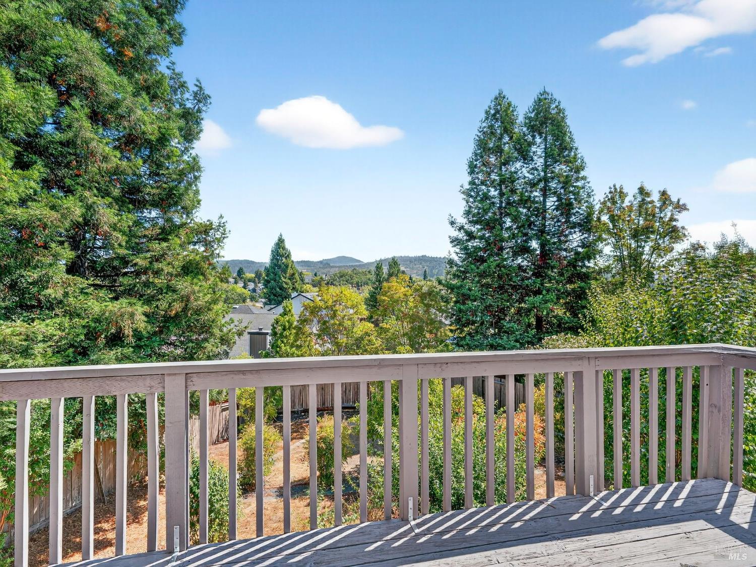 5794 Owl Hill Avenue Santa Rosa, CA 95409 - Photo 50 of 56 a balcony with wooden floor and fence