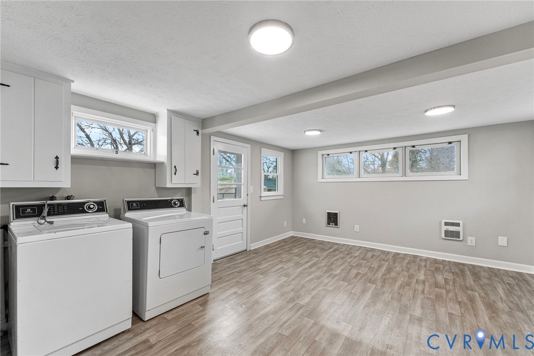 159 2nd Street Appomattox, VA 24522 - Photo 11 of 30 a kitchen with cabinets appliances and wooden floor
