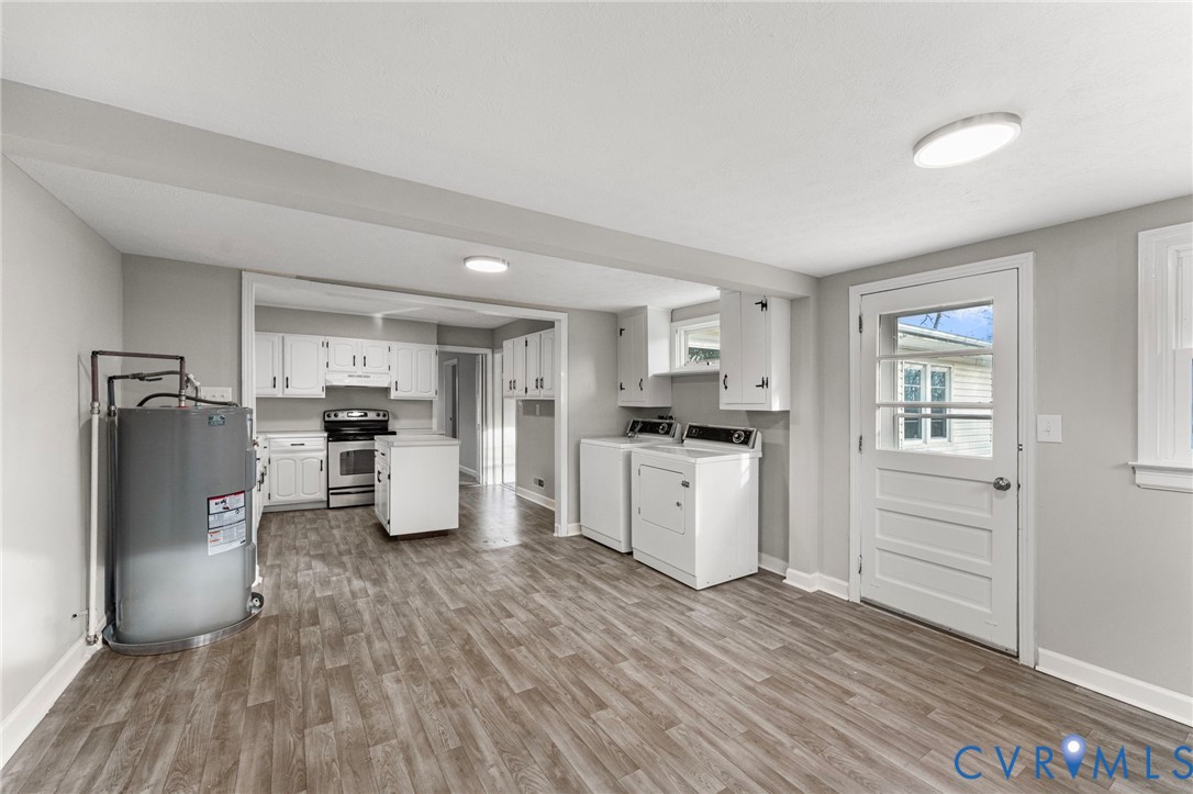 159 2nd Street Appomattox, VA 24522 - Photo 12 of 30 a kitchen with refrigerator and cabinets