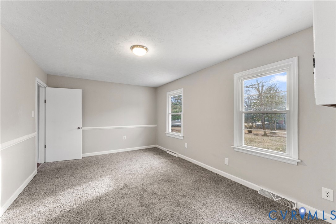 159 2nd Street Appomattox, VA 24522 - Photo 13 of 30 an empty room with windows and closet