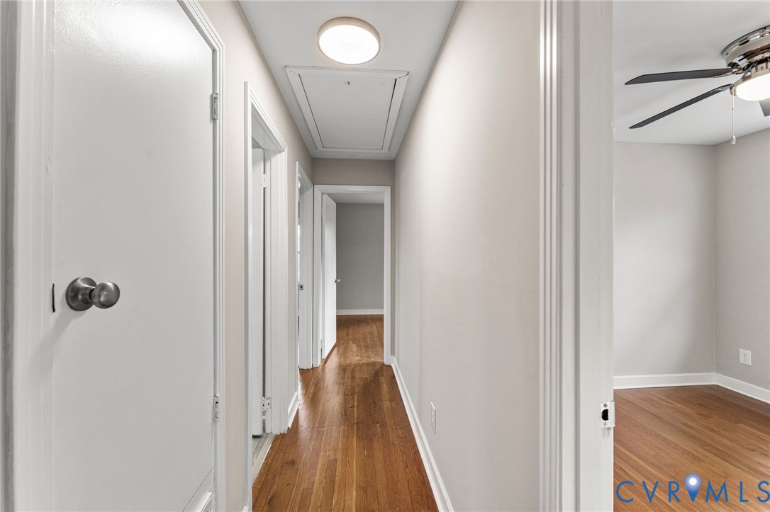 159 2nd Street Appomattox, VA 24522 - Photo 15 of 30 a view of hallway with stairs and wooden floor