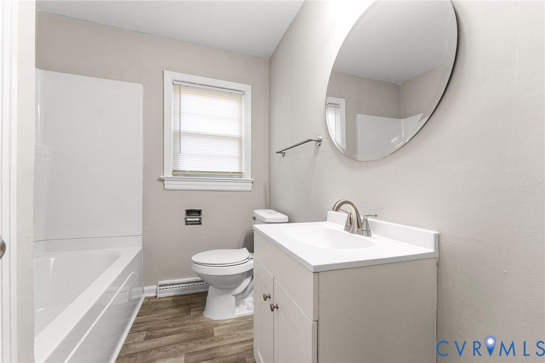 159 2nd Street Appomattox, VA 24522 - Photo 18 of 30 a bathroom with a sink and a mirror