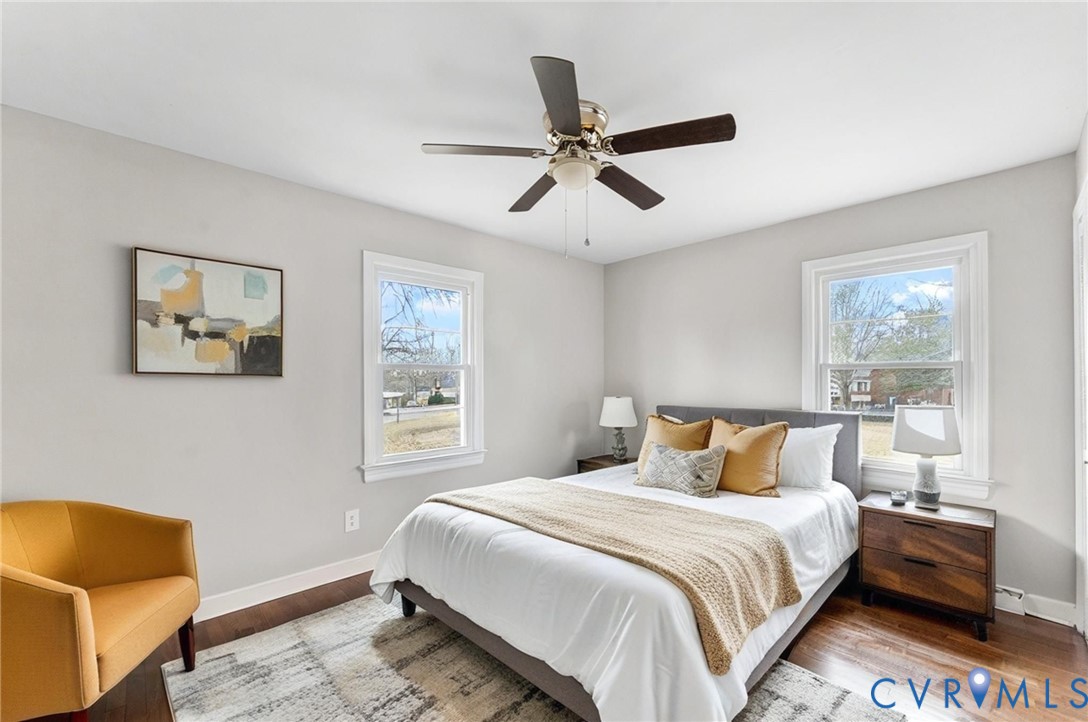 159 2nd Street Appomattox, VA 24522 - Photo 20 of 30 a bedroom with a bed and wooden floor