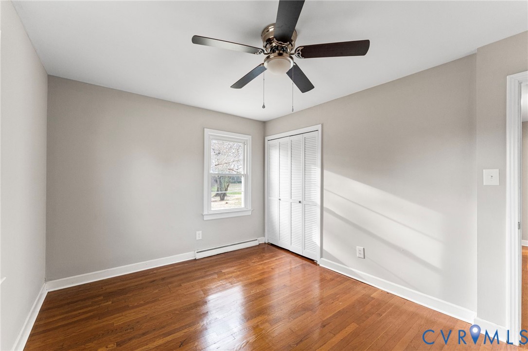 159 2nd Street Appomattox, VA 24522 - Photo 24 of 30 wooden floor in an empty room with a window