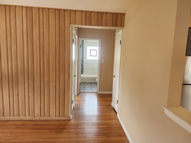 2939 South 13th Avenue, Unit 2N Broadview, IL 60155 - Photo 11 of 18 a view of a hallway with wooden floor