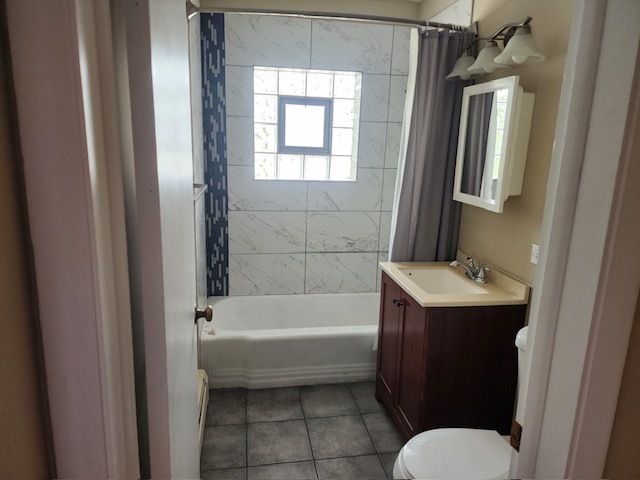 2939 South 13th Avenue, Unit 2N Broadview, IL 60155 - Photo 15 of 18 a bathroom with a sink toilet and shower