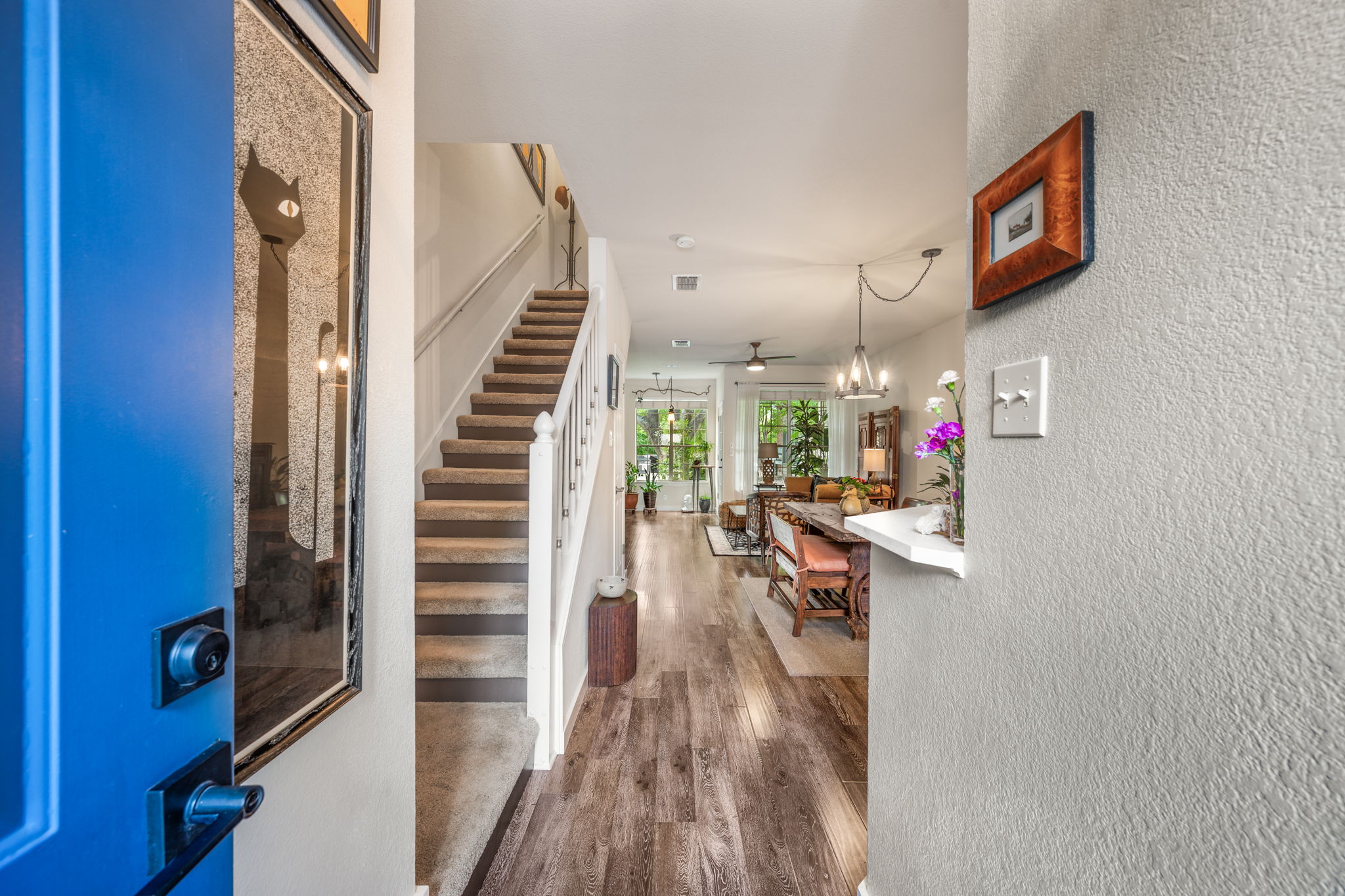 12401 Los Indios Trail, Unit 32 Austin, TX 78729 - Photo 2 of 39 An inviting entry opens to rich floors.