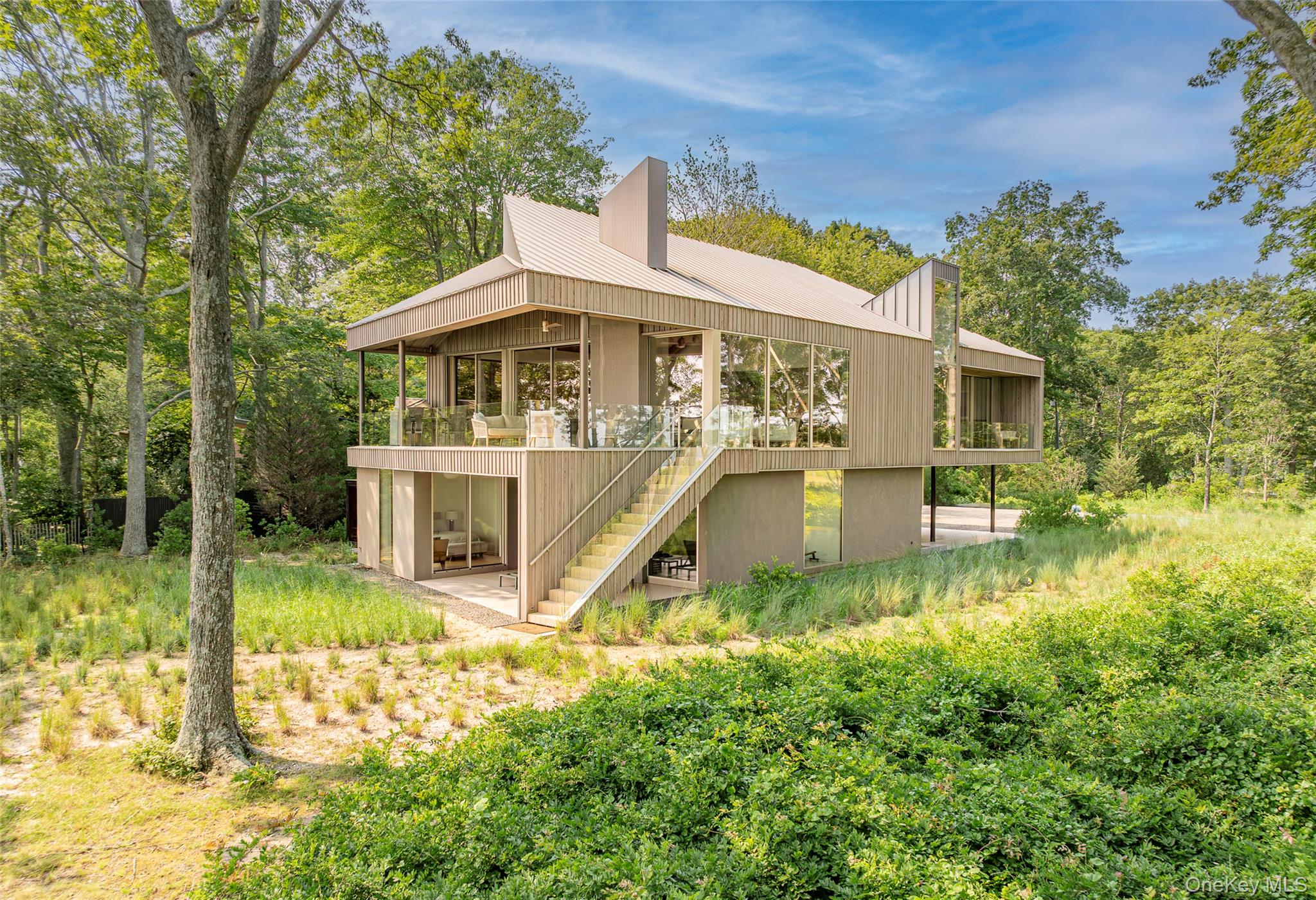 47 L South Ferry Road Shelter Island, NY 11964 - Photo 3 of 35 Rear view of house with stairway
