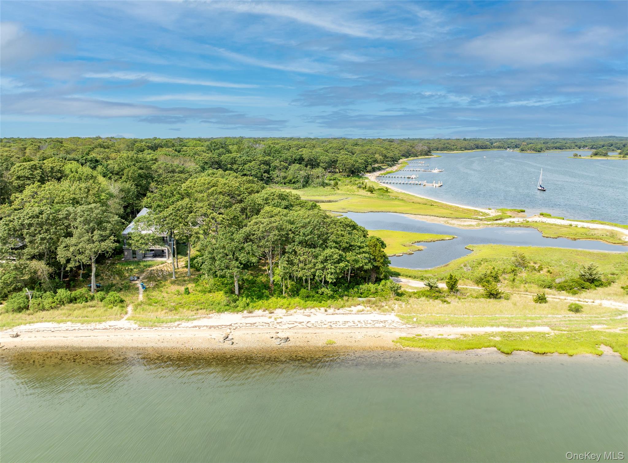 47 L South Ferry Road Shelter Island, NY 11964 - Photo 4 of 35 Bird's eye view of a large body of water and a heavily wooded area