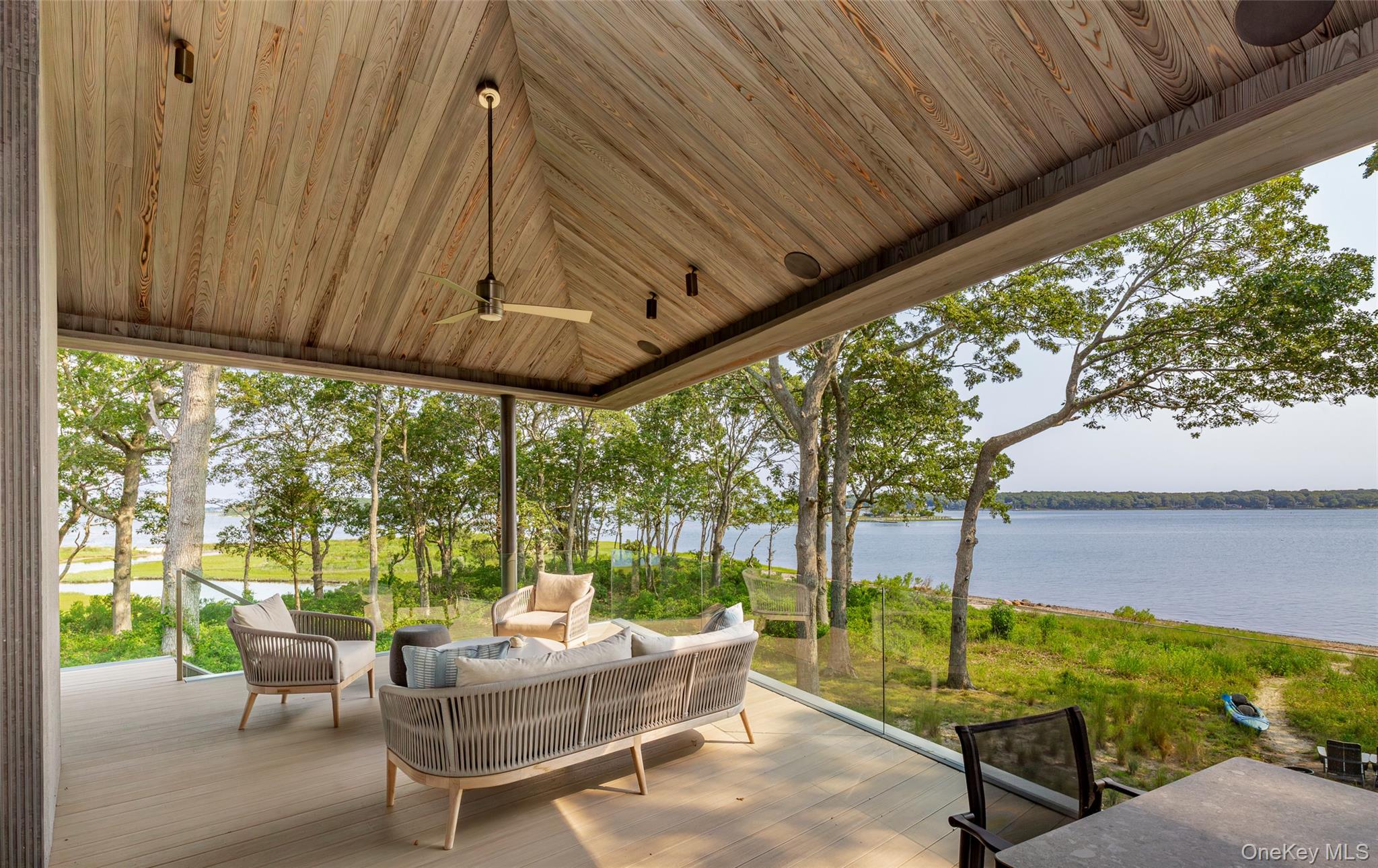 47 L South Ferry Road Shelter Island, NY 11964 - Photo 5 of 35 View of patio / terrace featuring an outdoor living space and a deck with water view