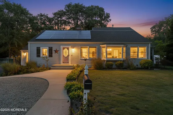 a house view with a outdoor space