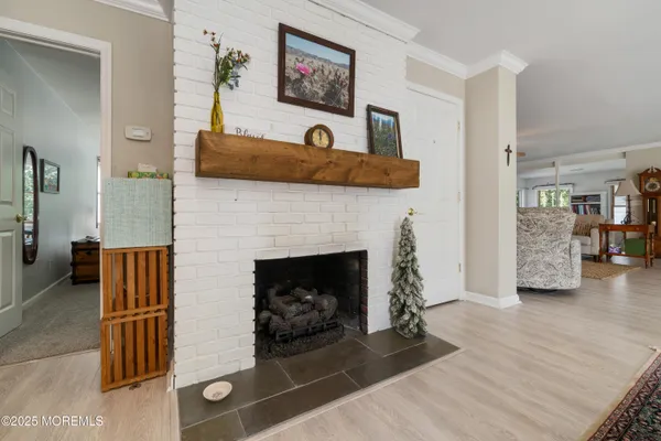 a view of a patio with table and chairs and potted plants