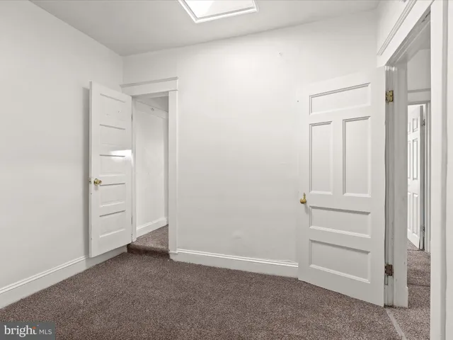 wooden floor and closet in a room