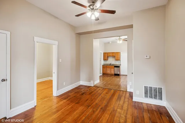 a view of a livingroom with wooden floor