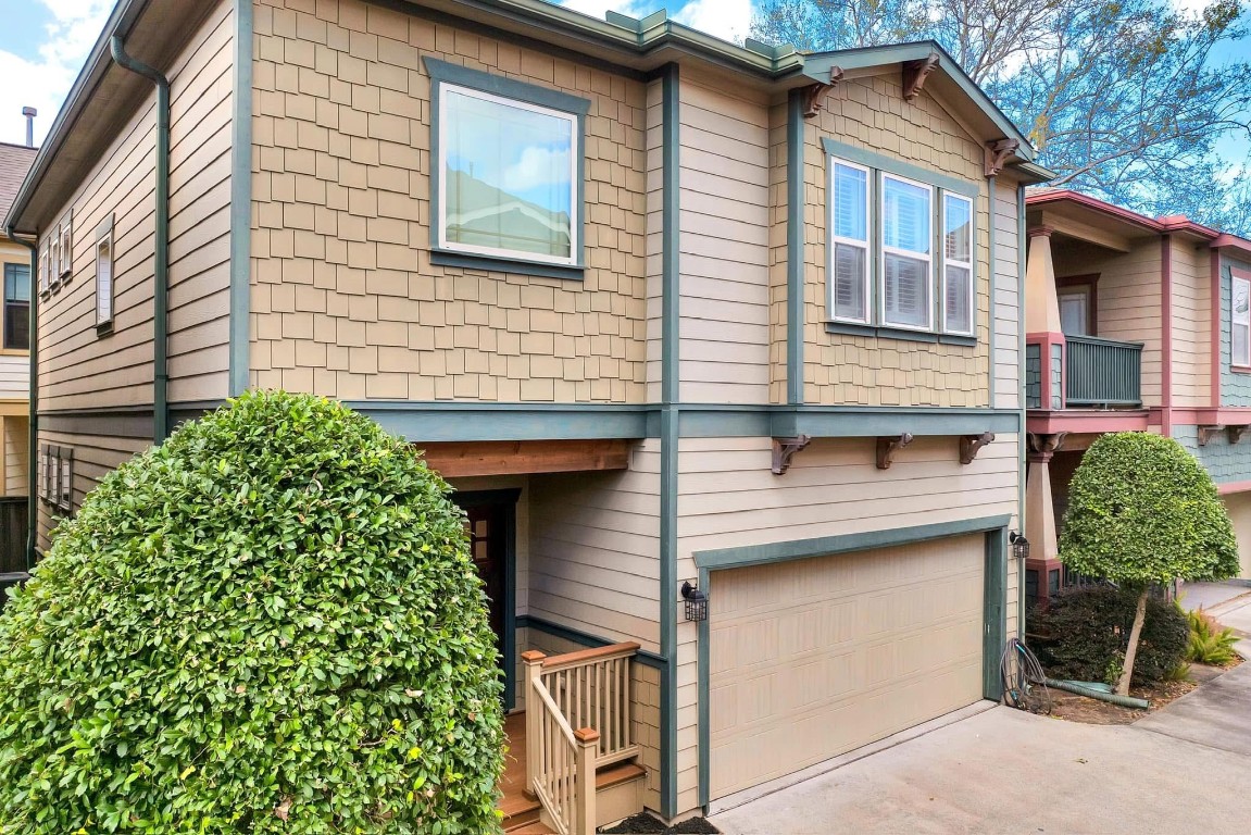 5832 Darling Street, Unit 5 Houston, TX 77007 - Photo 2 of 28 a view of a house with a yard and plants