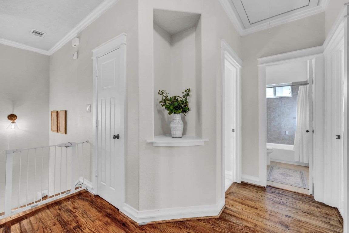 5832 Darling Street, Unit 5 Houston, TX 77007 - Photo 25 of 28 a view of room with hardwood floor and cabinet