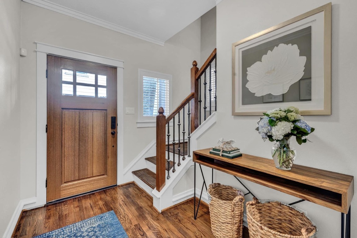 5832 Darling Street, Unit 5 Houston, TX 77007 - Photo 3 of 28 a view of staircase with furniture and a potted plant
