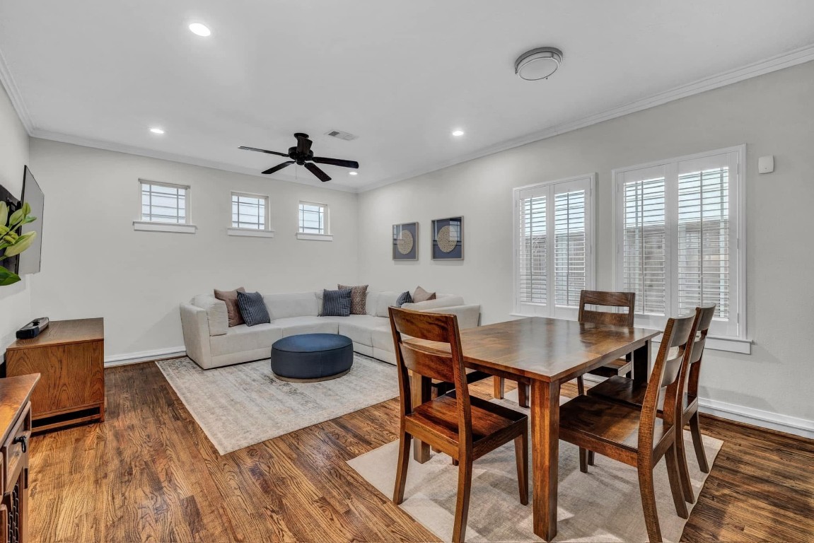 5832 Darling Street, Unit 5 Houston, TX 77007 - Photo 8 of 28 a view of a dining room with furniture and wooden floor
