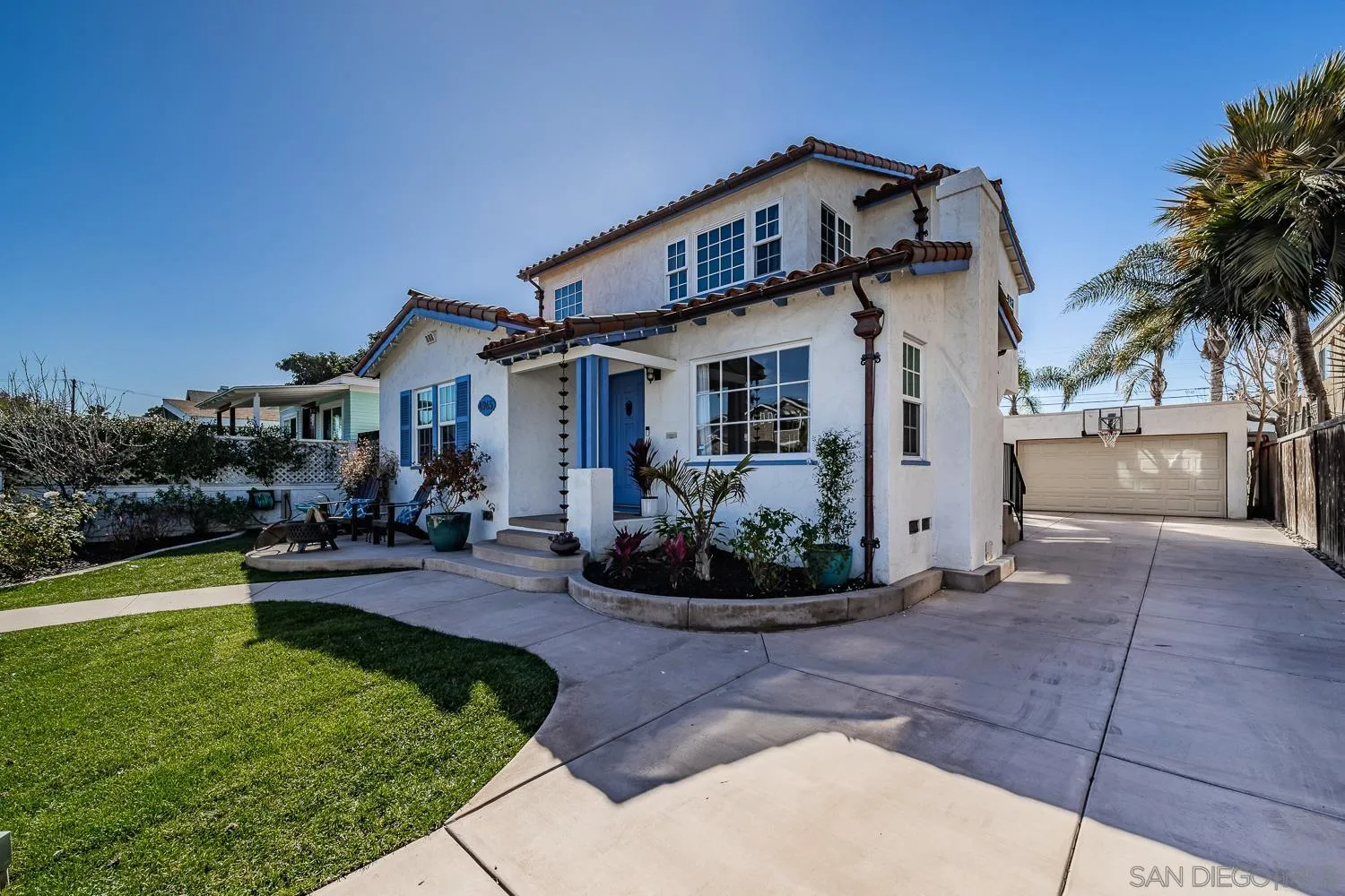 4965 Brighton Avenue Ocean Beach, CA 92107 - Photo 2 of 48 a front view of a house with garden