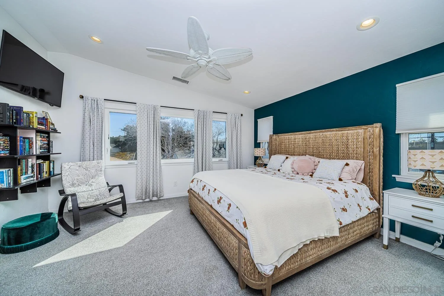 4965 Brighton Avenue Ocean Beach, CA 92107 - Photo 31 of 48 a bedroom with a bed couch and a window