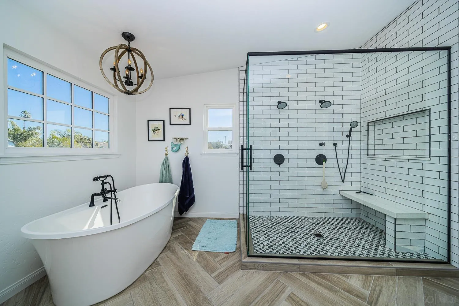 4965 Brighton Avenue Ocean Beach, CA 92107 - Photo 35 of 48 a bathroom with a bathtub and a shower