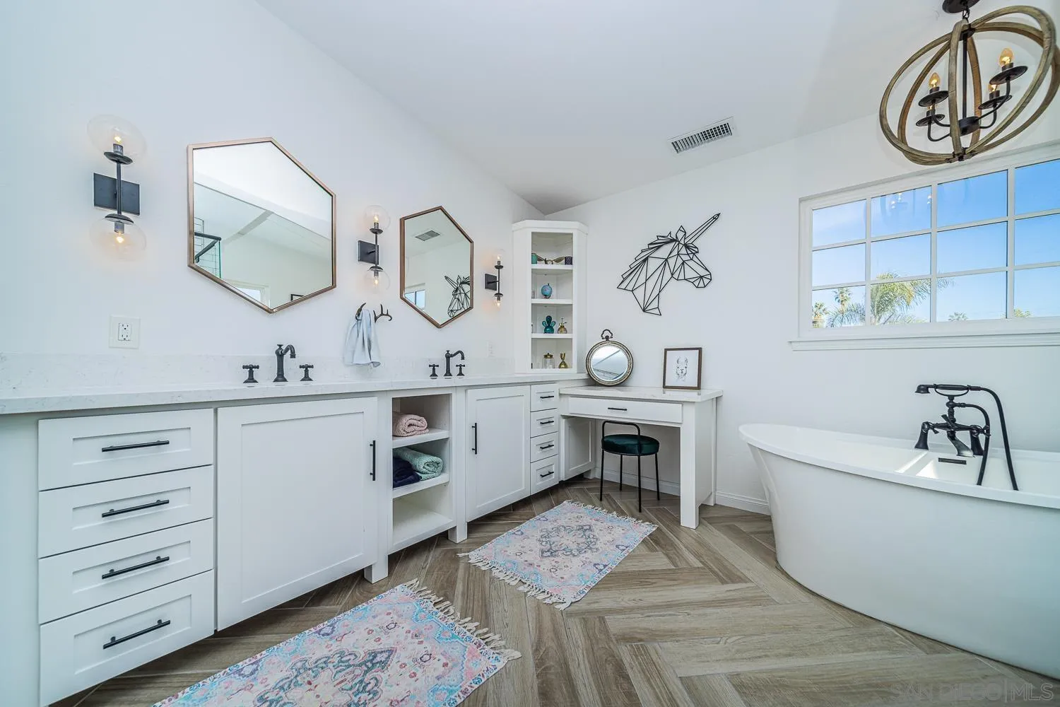 4965 Brighton Avenue Ocean Beach, CA 92107 - Photo 36 of 48 a bathroom with a bathtub sink and mirror