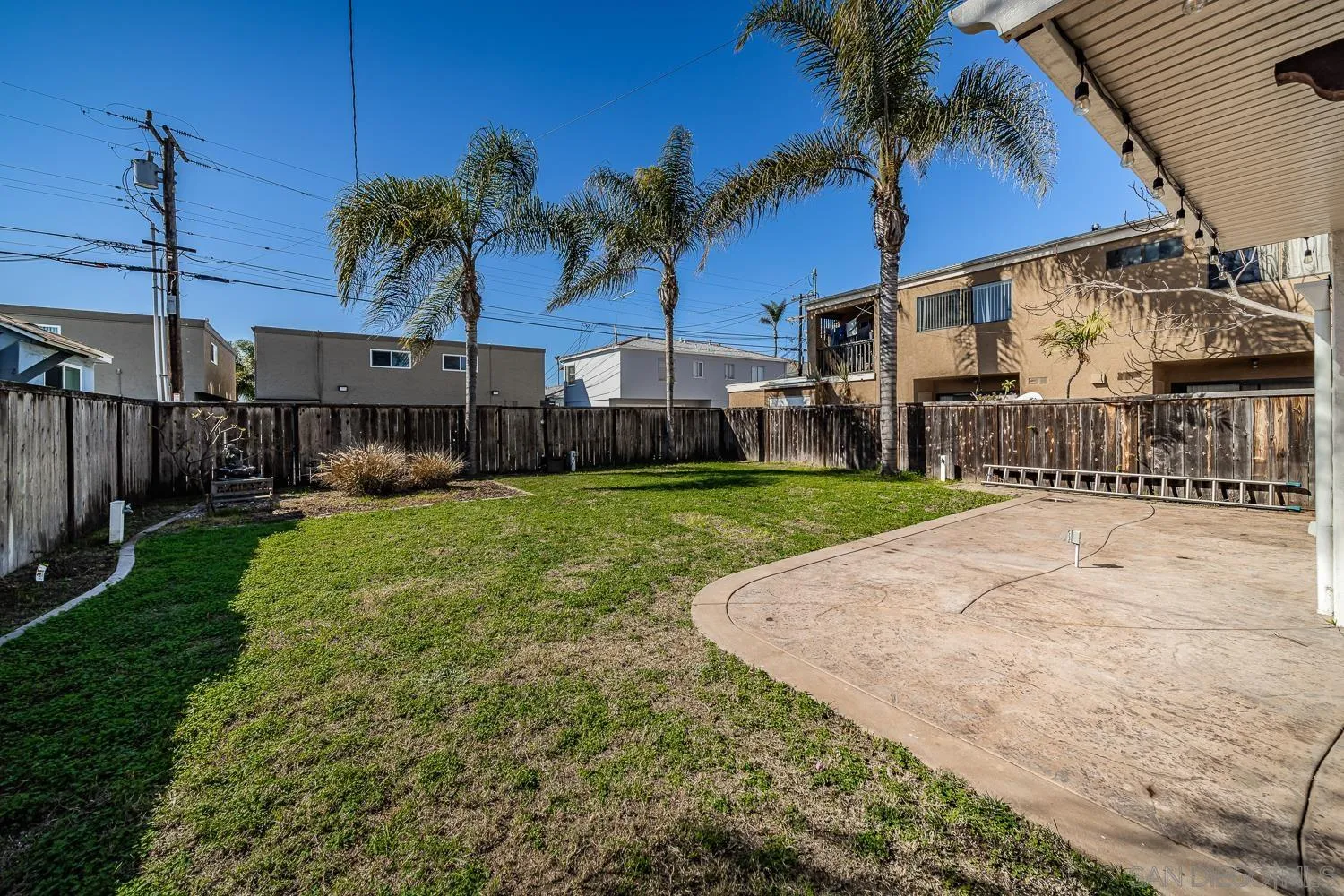 4965 Brighton Avenue Ocean Beach, CA 92107 - Photo 8 of 48 a view of a house with a yard