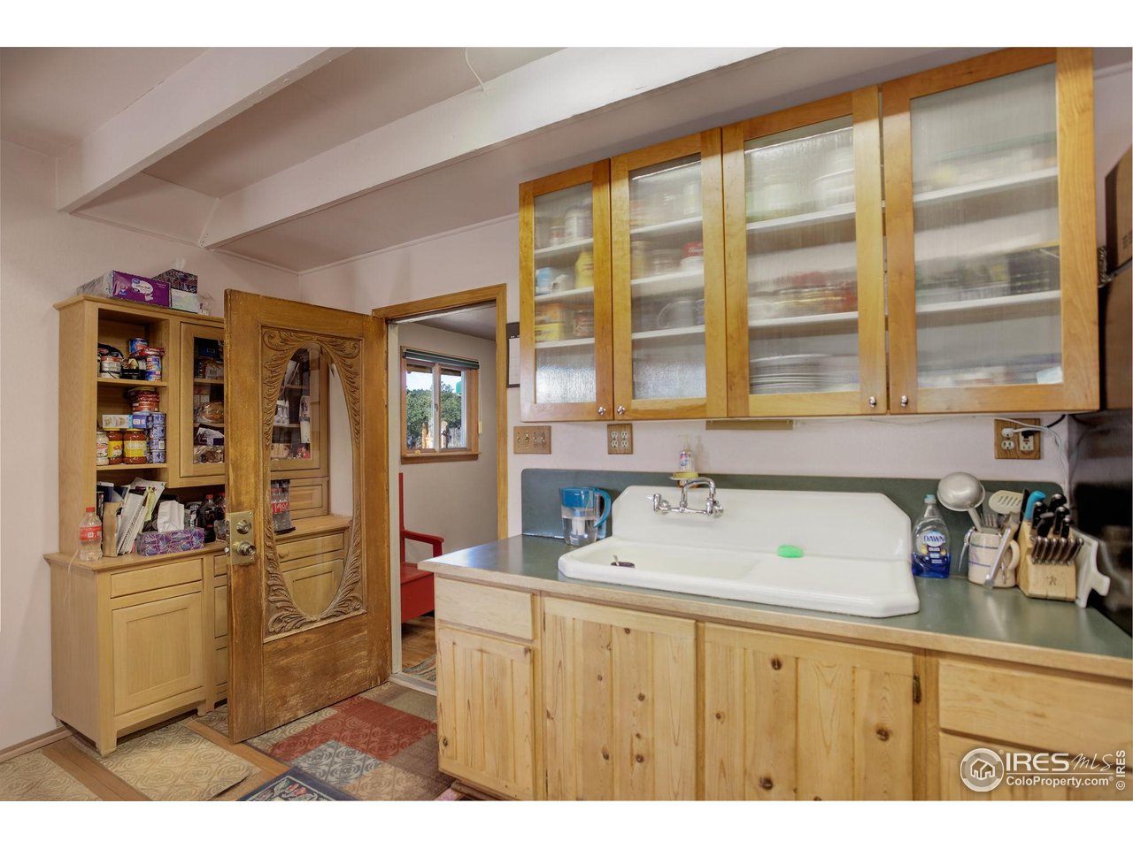 147 Cedar Drive Lyons, CO 80540 - Photo 13 of 37 Spacious kitchen with no lack of storage.