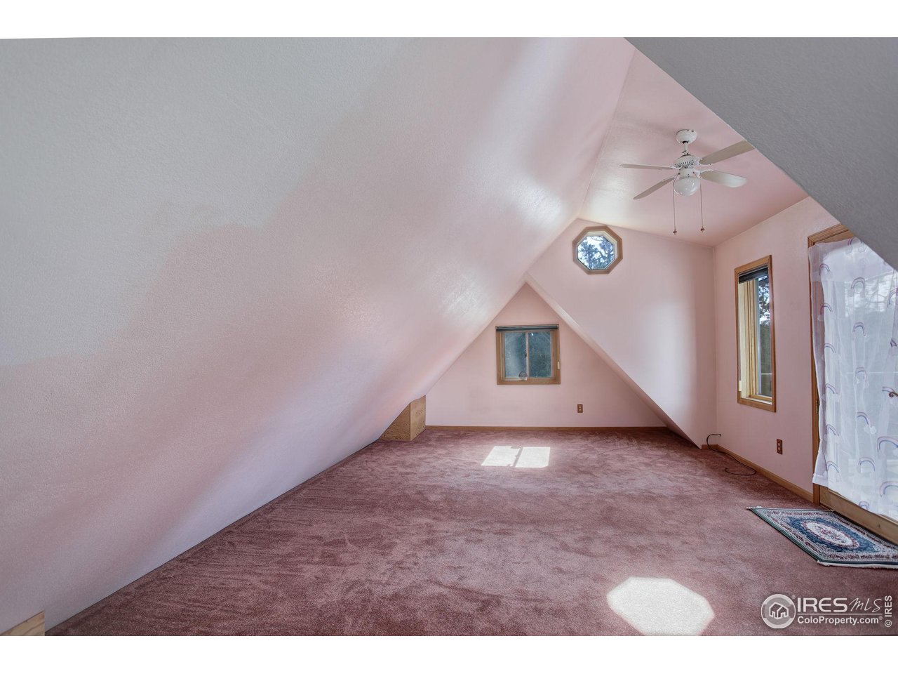 147 Cedar Drive Lyons, CO 80540 - Photo 18 of 37 Loft space view looking East.