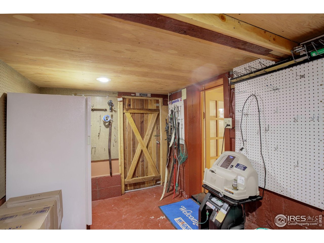 147 Cedar Drive Lyons, CO 80540 - Photo 24 of 37 Shop space with access to outside.