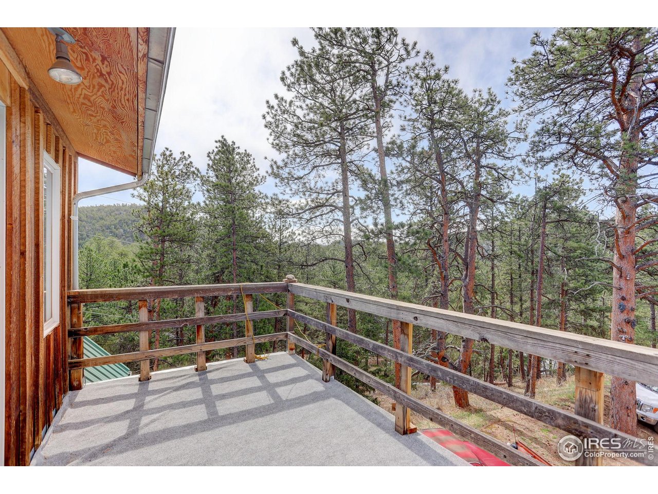 147 Cedar Drive Lyons, CO 80540 - Photo 26 of 37 Balcony deck looking East.